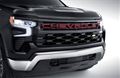 Grille in Black with Chevrolet Script Lettering in Red 85529035